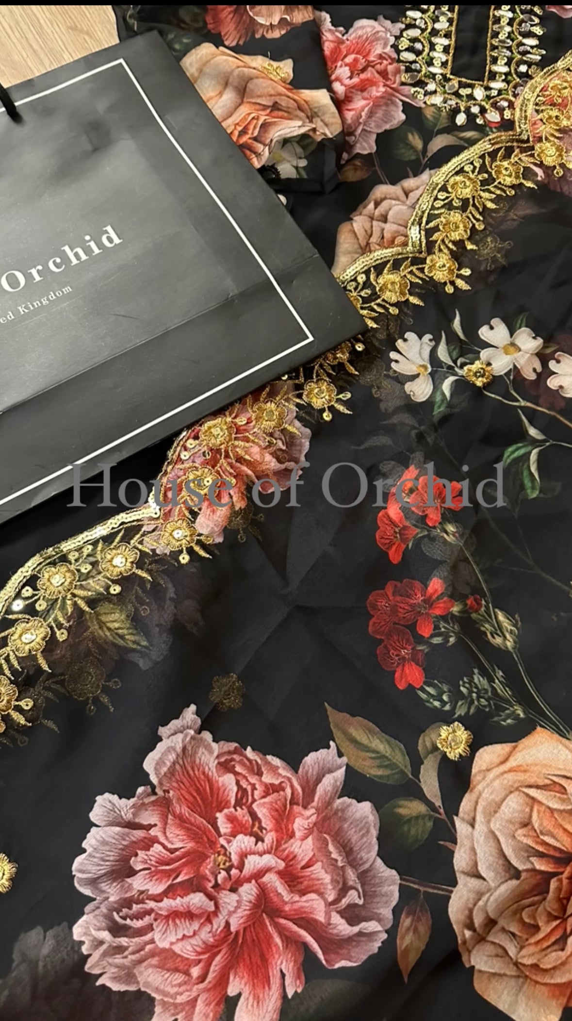 Black floral suit