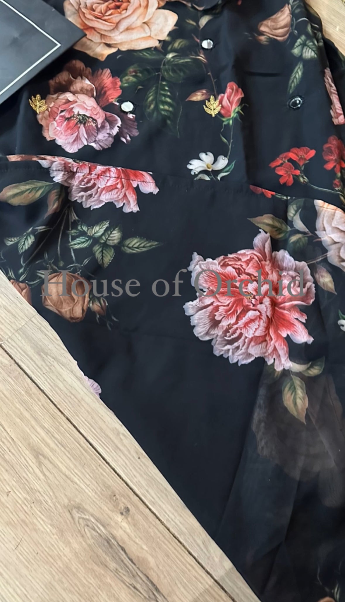 Black floral suit