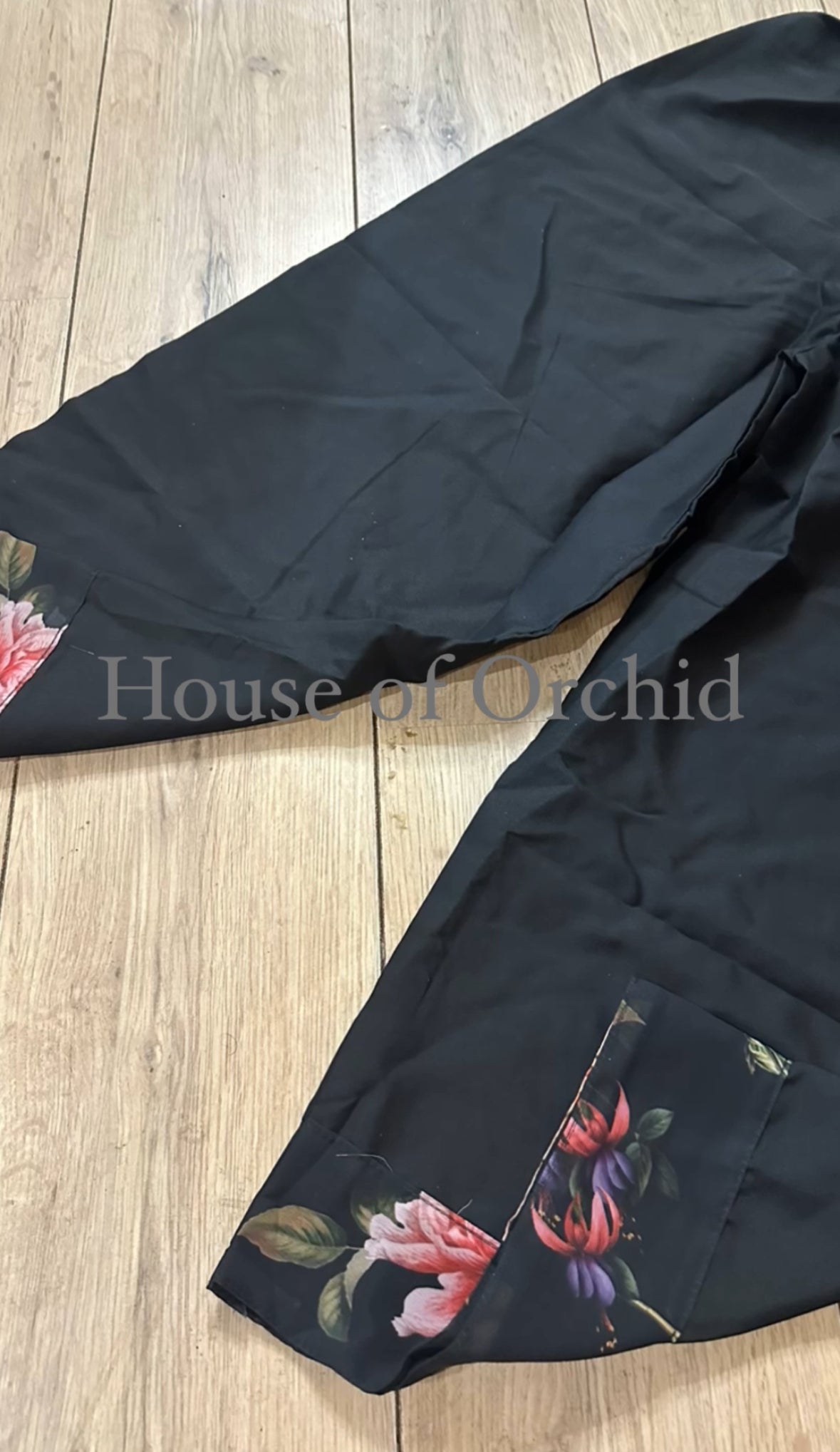 Black floral suit